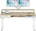 HUANUO 63″ x 26″ Electric Standing Desk with 2 Drawers &24.4″ Large Keyboard Tray, C-Clamp Mount Compatible, Adjustable Computer Desk for Office, Sit Stand Up Desk with 4 Height Presets, Light Walnut