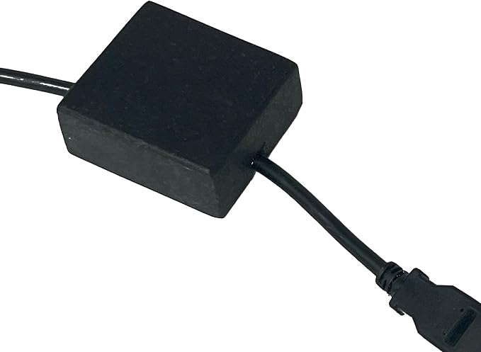 Cord Holder – Black Granite Cable Tidy, Single | Handmade honed black granite cord holder keeps a charging cable tidy on your desk. Weighted, non-slip. Single slot.