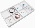 The Display Guys - Stackable Jewelry Tray and Organizer - for Drawers, Dressers, Store Display (8 Compartments, White Leatherette)