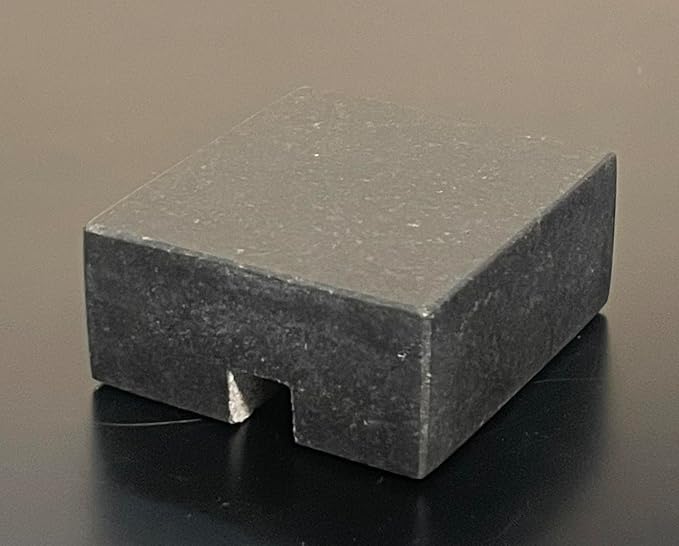 Cord Holder – Black Granite Cable Tidy, Single | Handmade honed black granite cord holder keeps a charging cable tidy on your desk. Weighted, non-slip. Single slot.