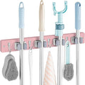 OUTNILI Pink Mop Broom Holder Wall Mount with 4 Slots & 4 Hooks - Wood Broom Mop Hanger for Pantry Closet Laundry Room Kitchen Organization - for Pink Kitchen Decor and Accessories