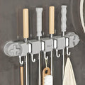 Broom Holder Wall Mount Sturdy Mop and Broom Organizer with 4 Racks and 5 Hooks Vacuum Suction Cup Broom Mop Holder for Home, kitchen, Garden, Tools, Garage (grey)