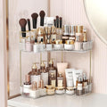 BEFSOP Corner Bathroom Counter Organizer, Upgraded 2-Tier Makeup Organizer Countertop with Makeup Brush Holder, Skincare Exquisite Vanity Organizers Countertop Bathroom Storage Dresser(CLEAR)