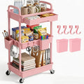 3 Tier Rolling Utility Cart with Drawer, Plastic Storage Organizer Rolling Carts with Wheels Handles Hanging Cups Hooks for Office, Bathroom, Kitchen,Craft Art Room (Pink)