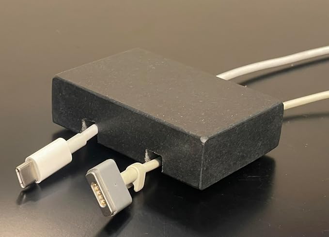 Cord Holder – Black Granite Cable Tidy, Double | Handmade honed black granite cord holder keeps charging cables tidy on your desk. Weighted, non-slip. Double slot.