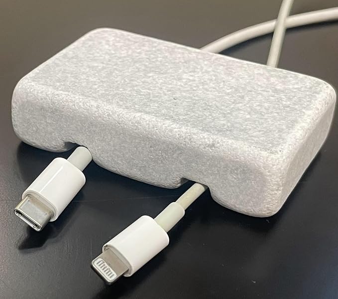 Cord Holder – Tumbled Marble Cable Tidy, Double | Handmade tumbled white marble cord holder keeps charging cables tidy on your desk. Weighted, non-slip. Double slot.