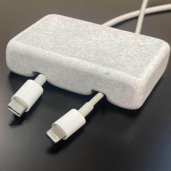 Cord Holder – Tumbled Marble Cable Tidy, Double | Handmade tumbled white marble cord holder keeps charging cables tidy on your desk. Weighted, non-slip. Double slot.