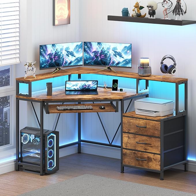 47" Corner Desk with Drawers, Power Outlets ＆ Printer Shelf for Small Space | Small Computer Desk with Monitor Stand, Triangle Gaming Desk with LED Lights and Keyboard Tray, Rustic Brown