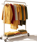 Sywhitta Clothing Rack on Wheels with Mesh Storage Shelf & Sturdy Metal Frame, Rolling Garment Rack for Hanging Clothes, Coats, Skirts, 39.76" L x 16" W x 64.56" H,White